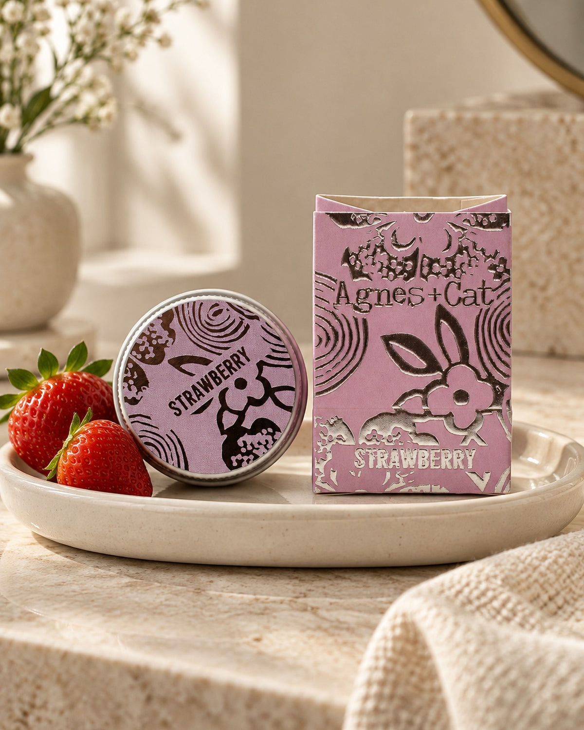Agnes + Cat Lip Balm, Strawberry, 12g styled in a calm spa setting, Tara Spa Yarm