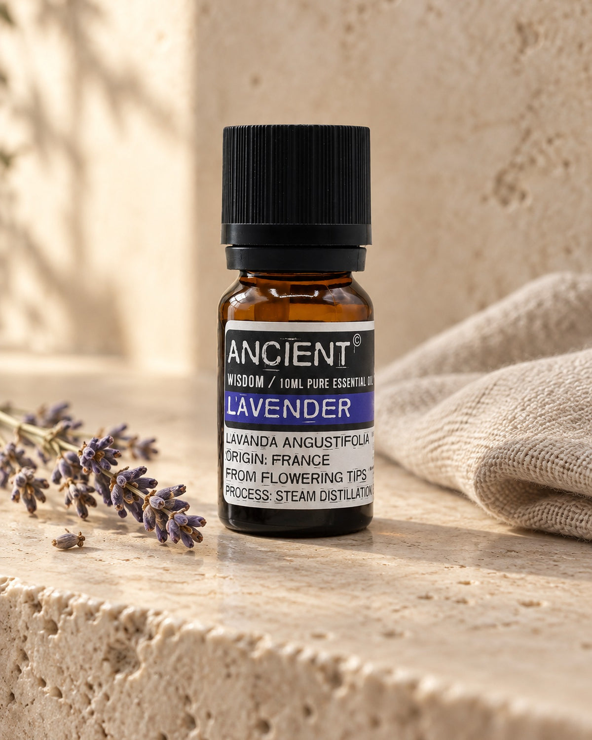 Lavender Essential Oil, 10ml styled in a calm spa setting, Tara Spa Yarm