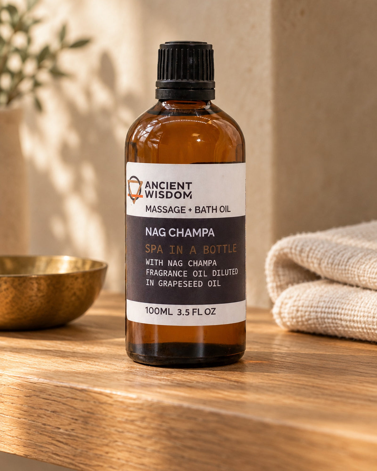 Nag Champa Massage Oil in Grapeseed Oil, 100ml styled in a calm spa setting, Tara Spa Yarm