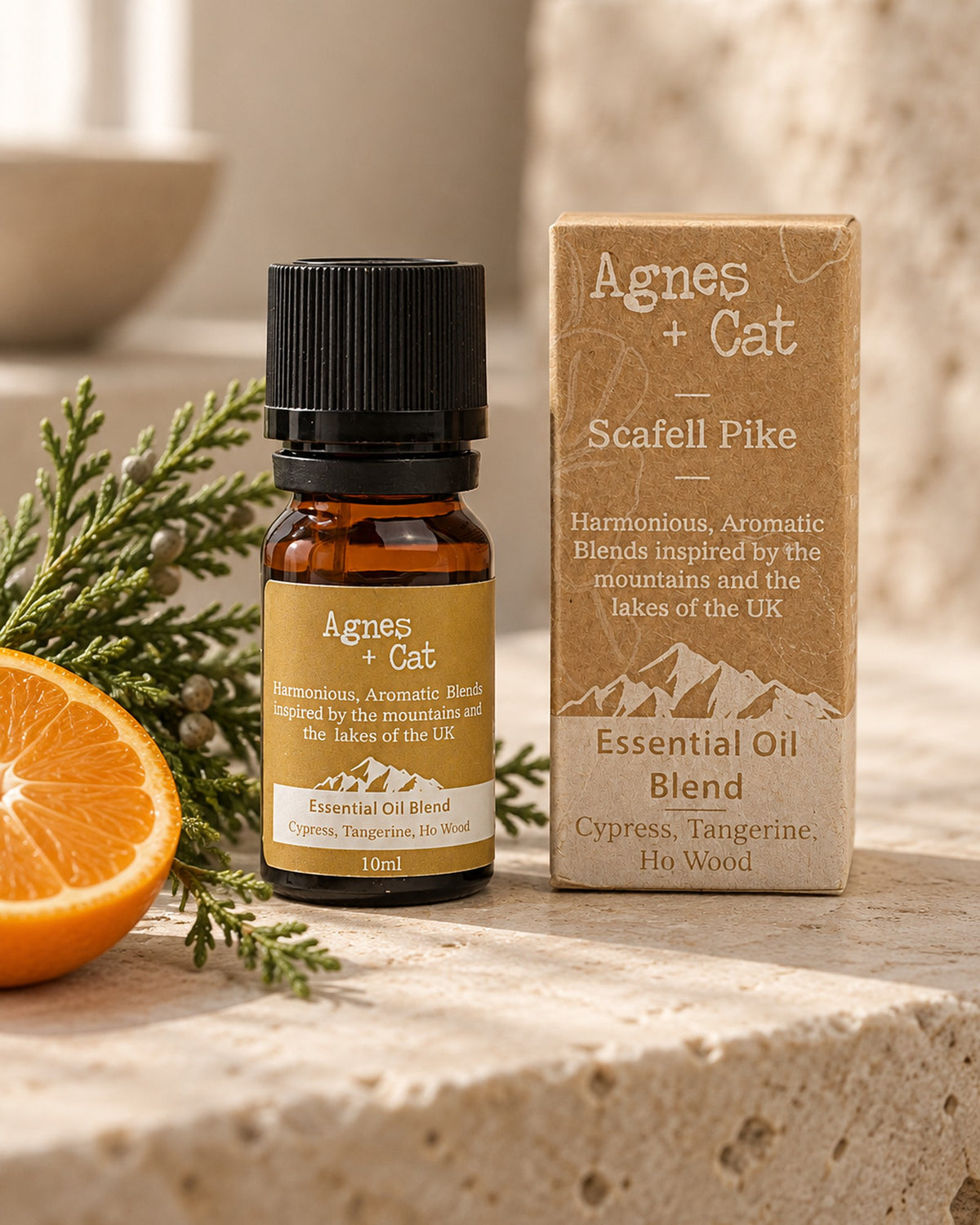 Agnes + Cat Scafell Pike Essential Oil Blend, Cypress, Tangerine and Ho Wood, 10ml styled in a calm spa setting, Tara Spa Yarm